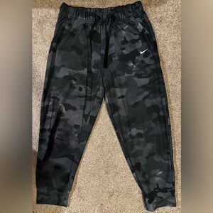 Nike, dark camo joggers. Size: Medium